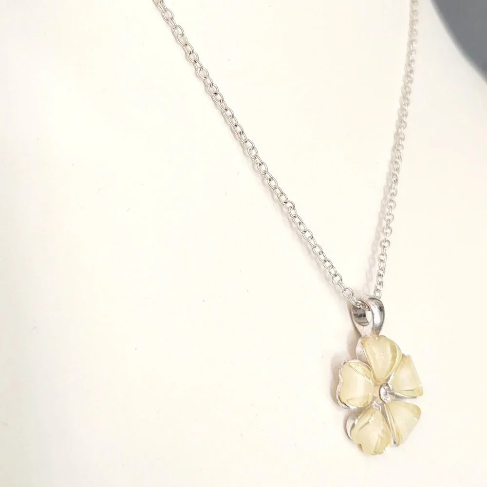 Cream flower pendant necklace with cz center and silver accents